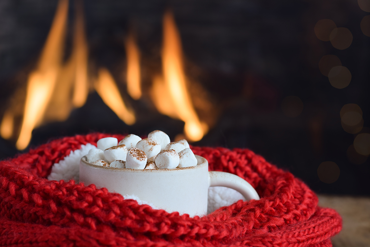 hot chocolate in front of a fire